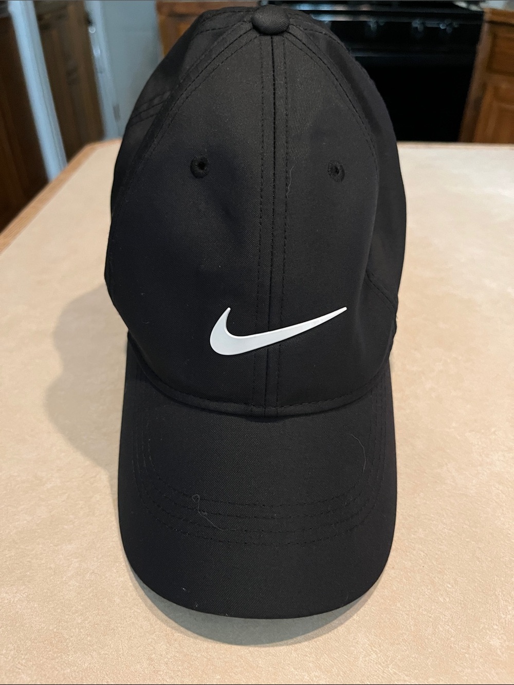 Woman’s Nike Black Baseball Cap with White Swoosh